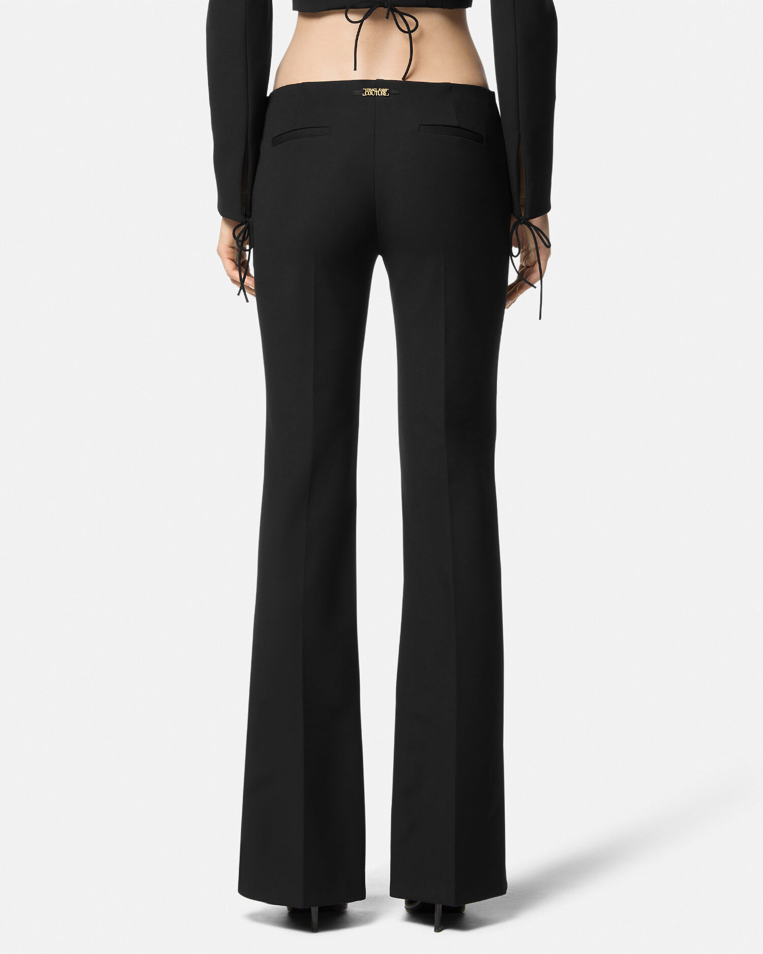 Pantalones acampanados con cordones VERSACE