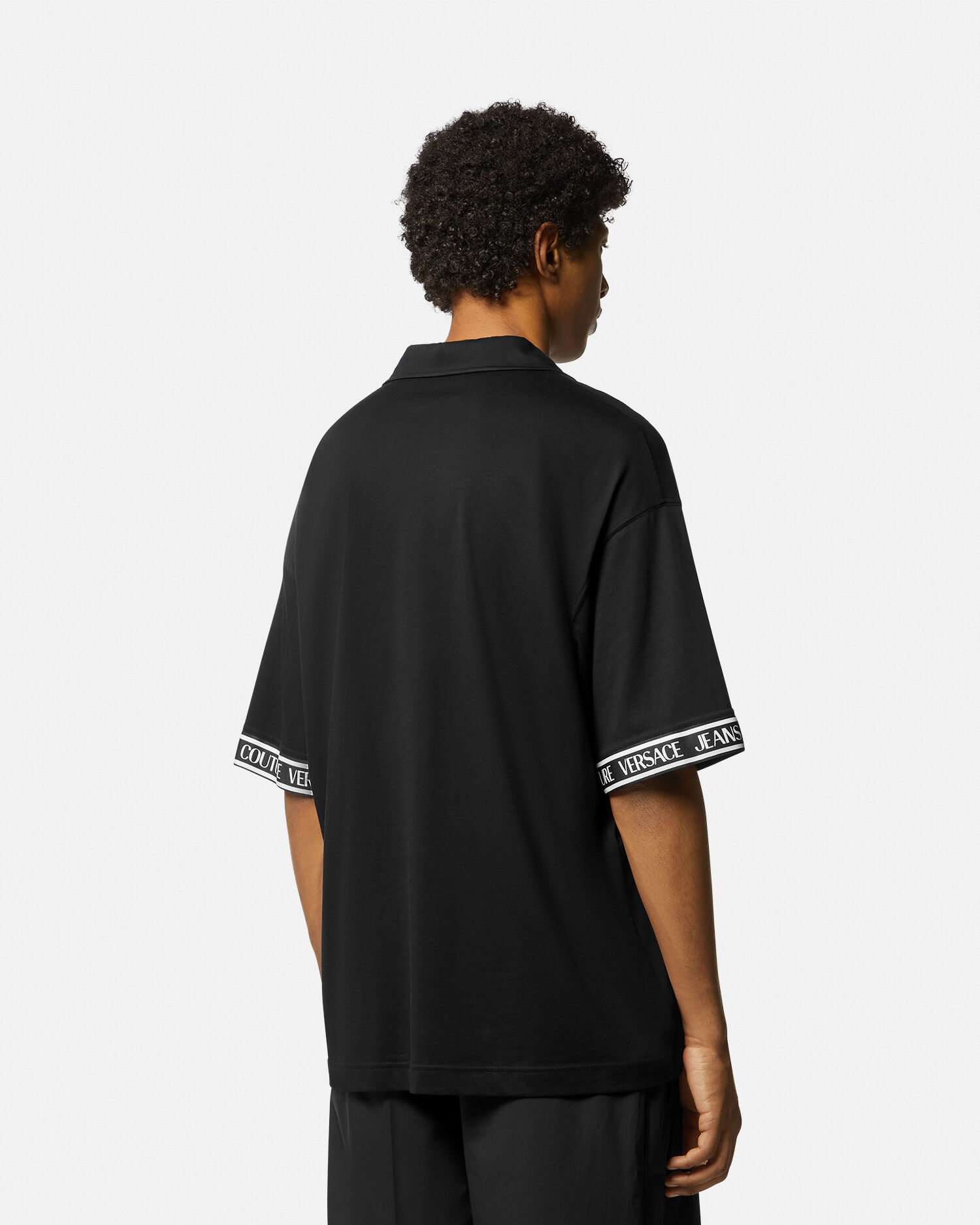 Polo a maniche corte logata Nero Stampa VERSACE IT