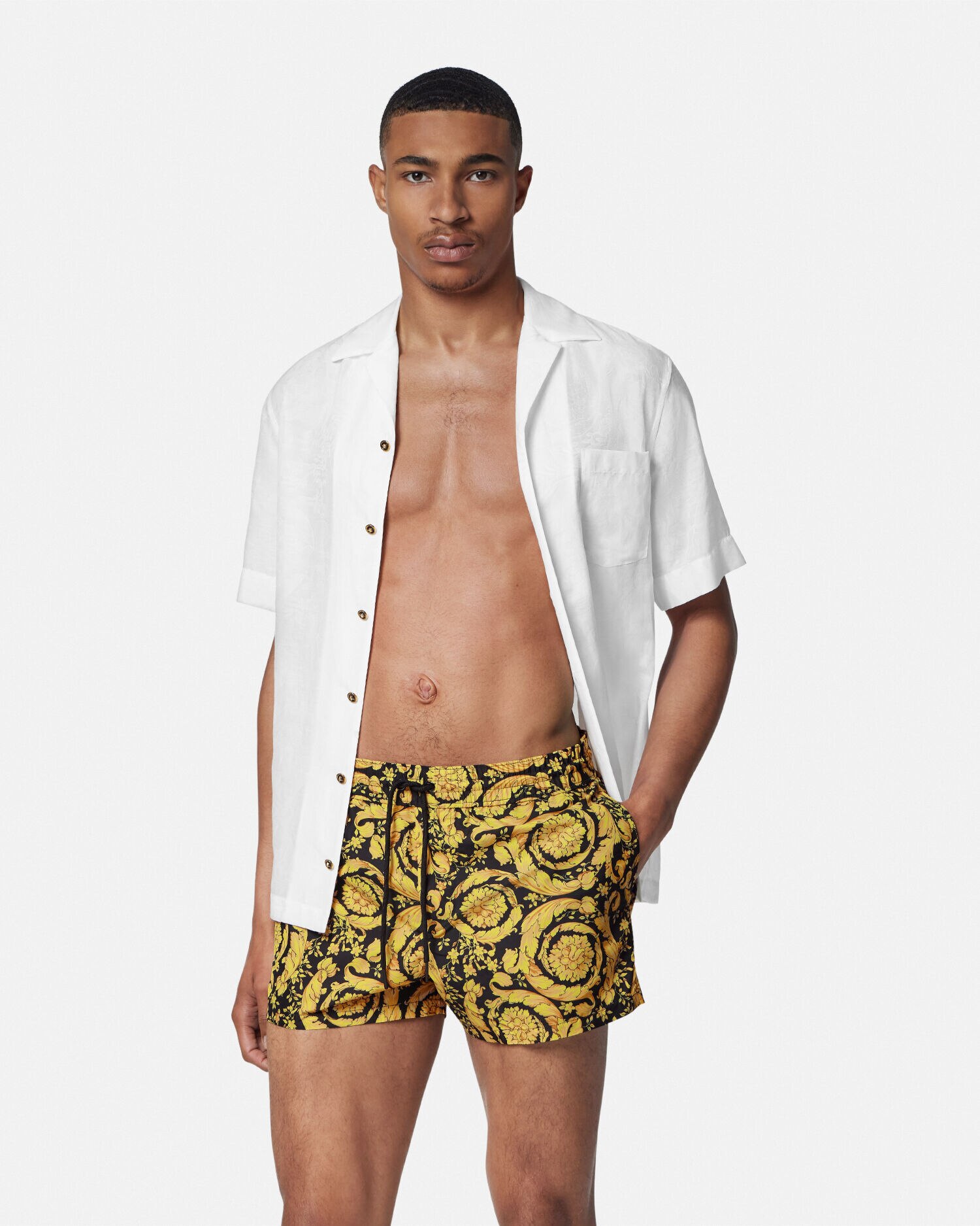 Versace print swim trunks top