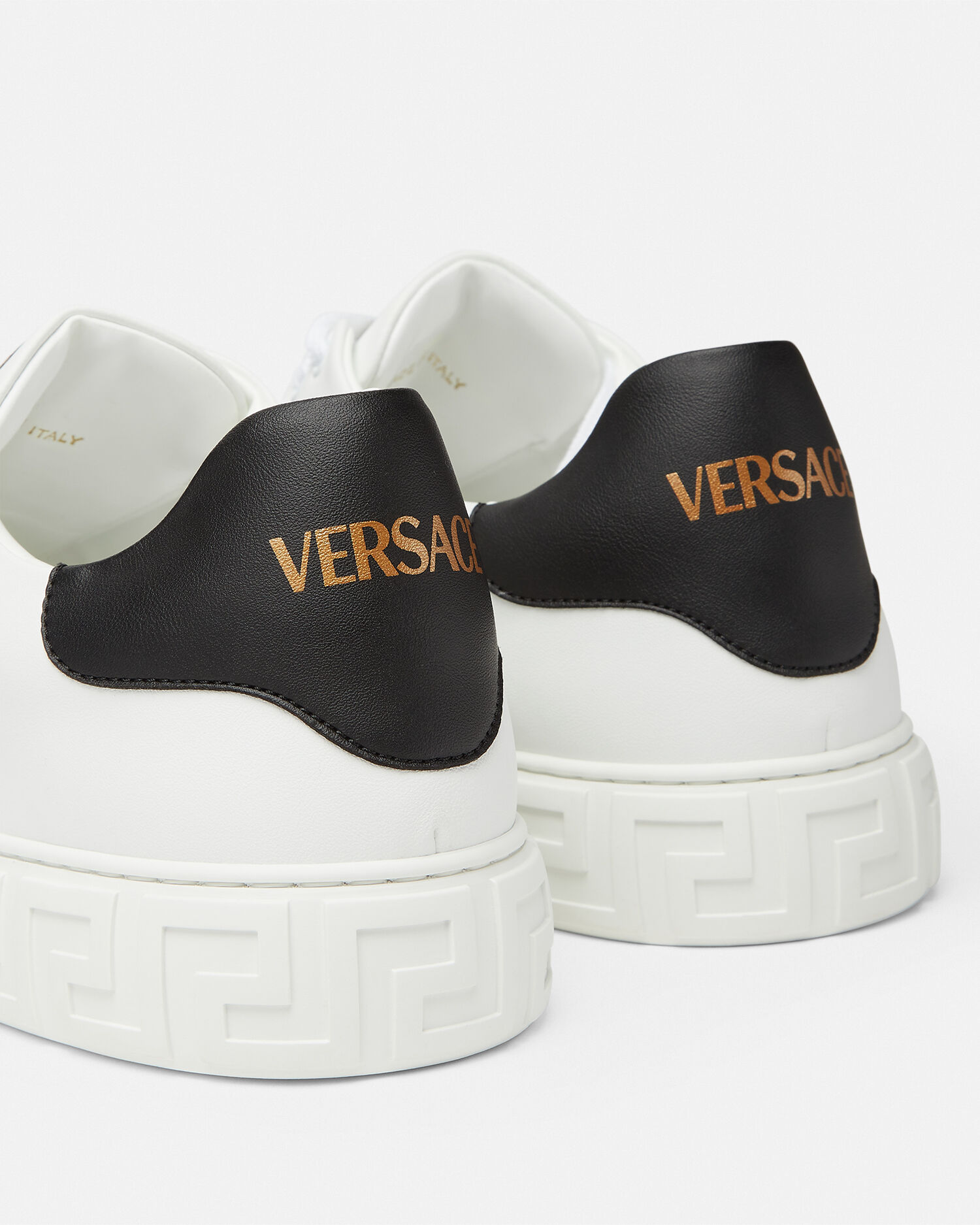 Greca sneaker con borchie