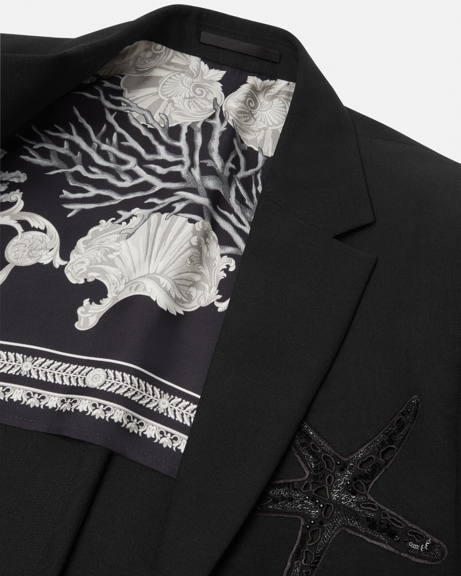 Bodysuit with cut-out details and baroque print brand