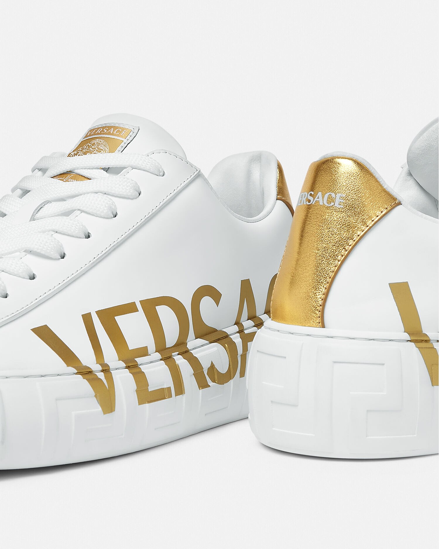Versace on sale logo trainers