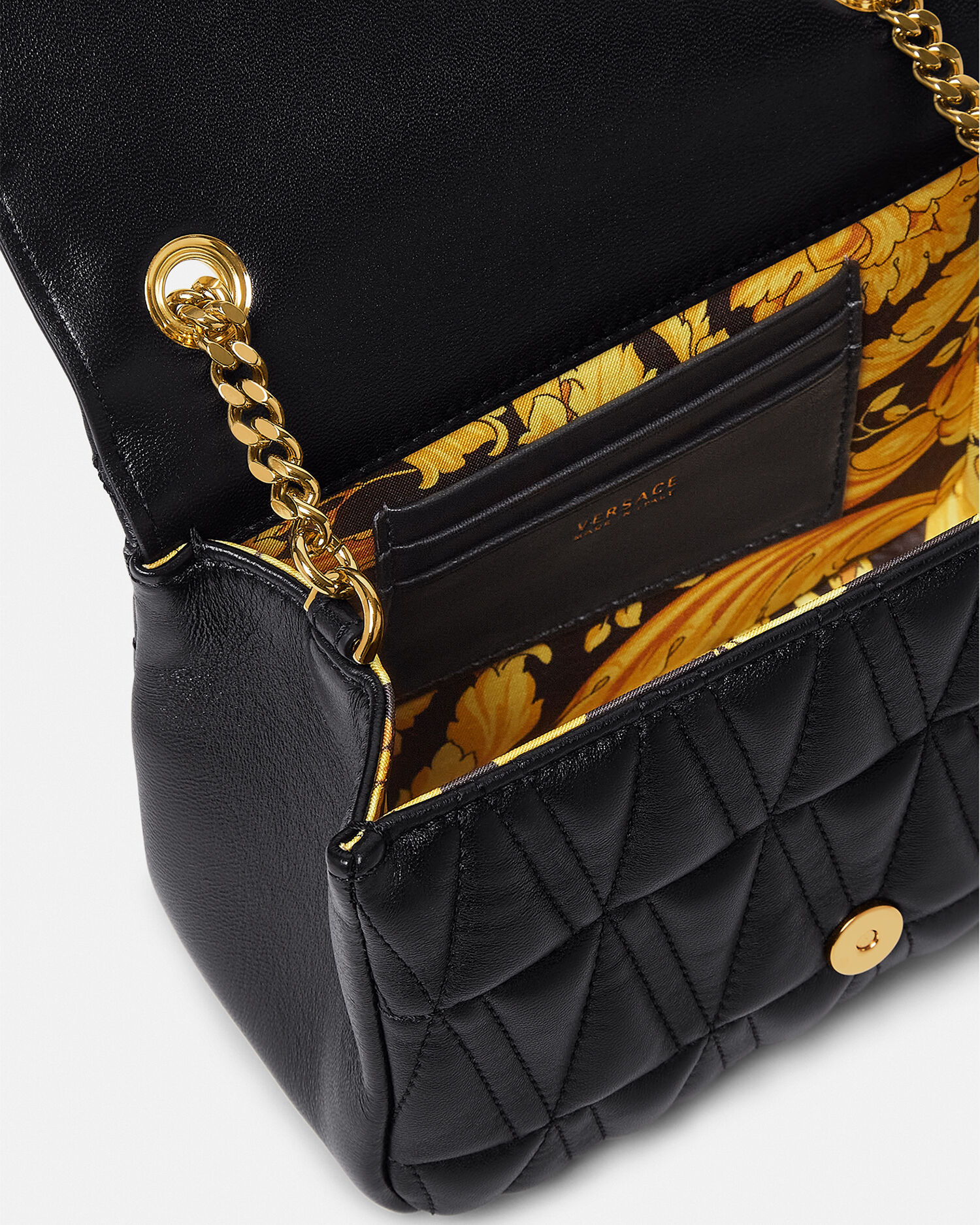 Versace quilted best sale shoulder bag