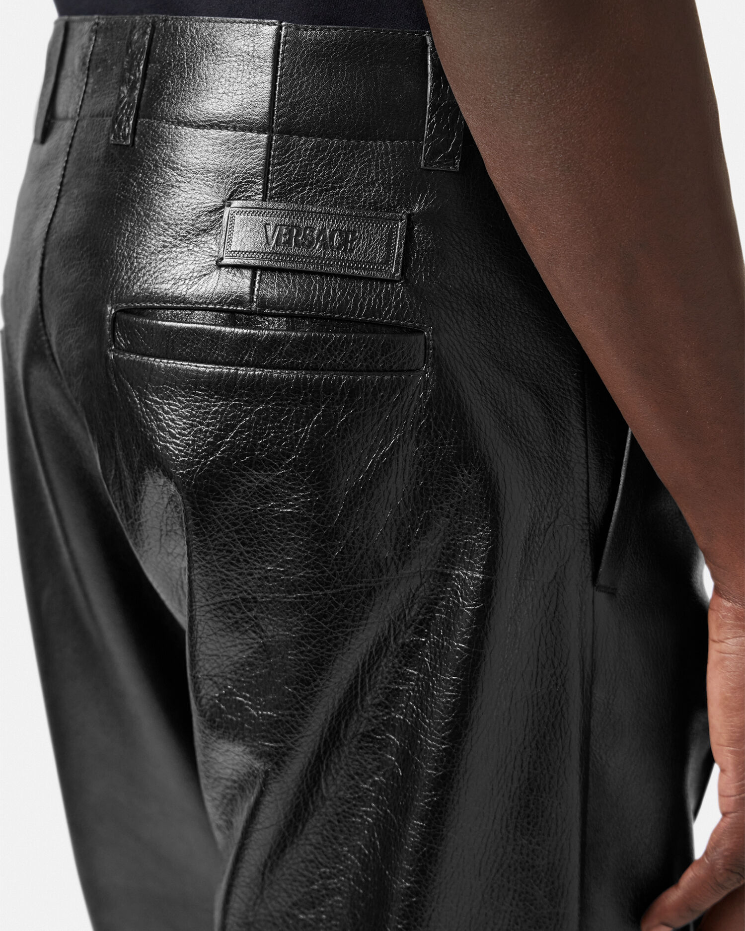 Versace store leather trousers