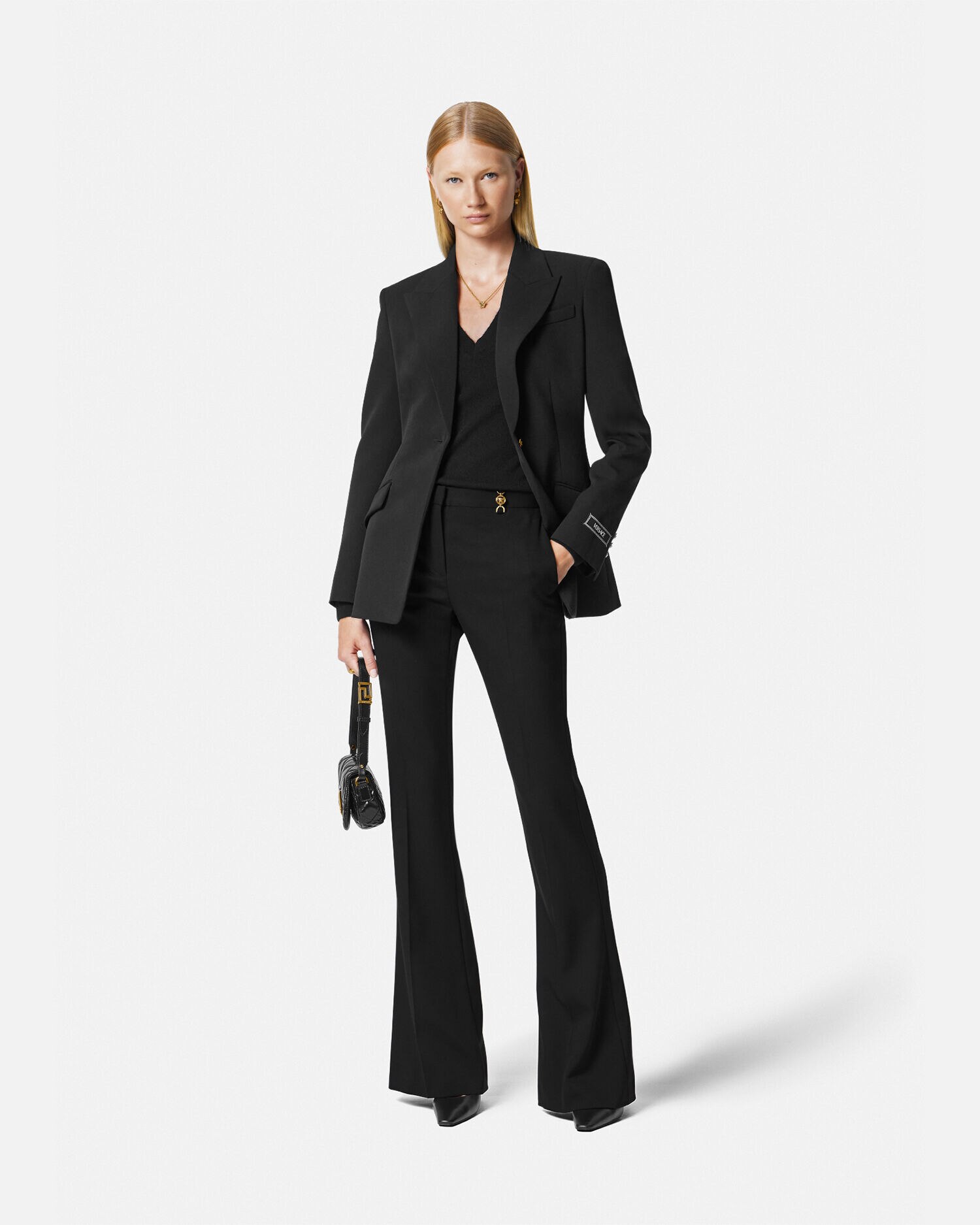 Pantalon new arrivals versace precio
