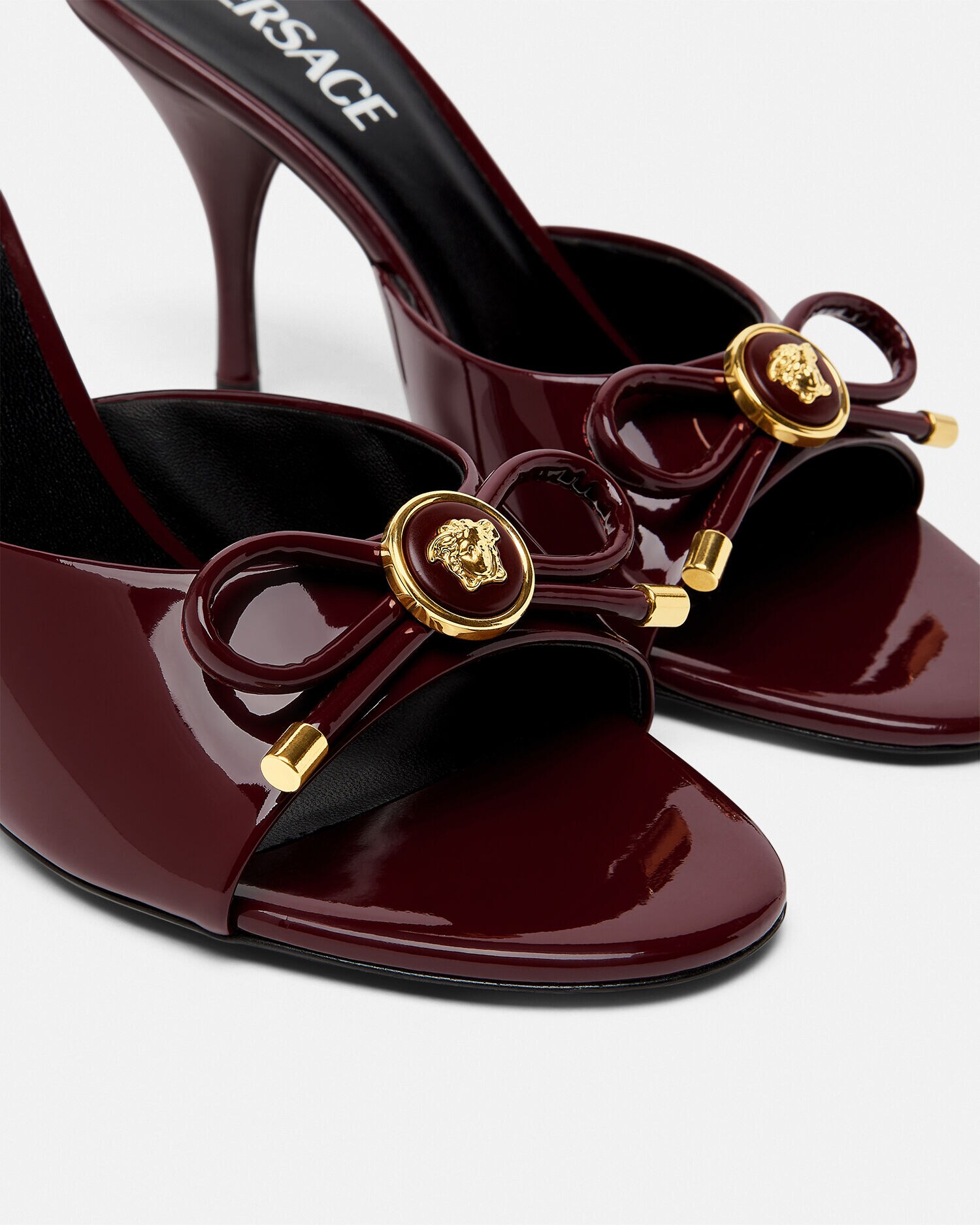 Opera Bow Patent Mules 85 mm Burgundy | VERSACE US Opera Bow Patent Mules 85 mm Burgundy | VERSACE US