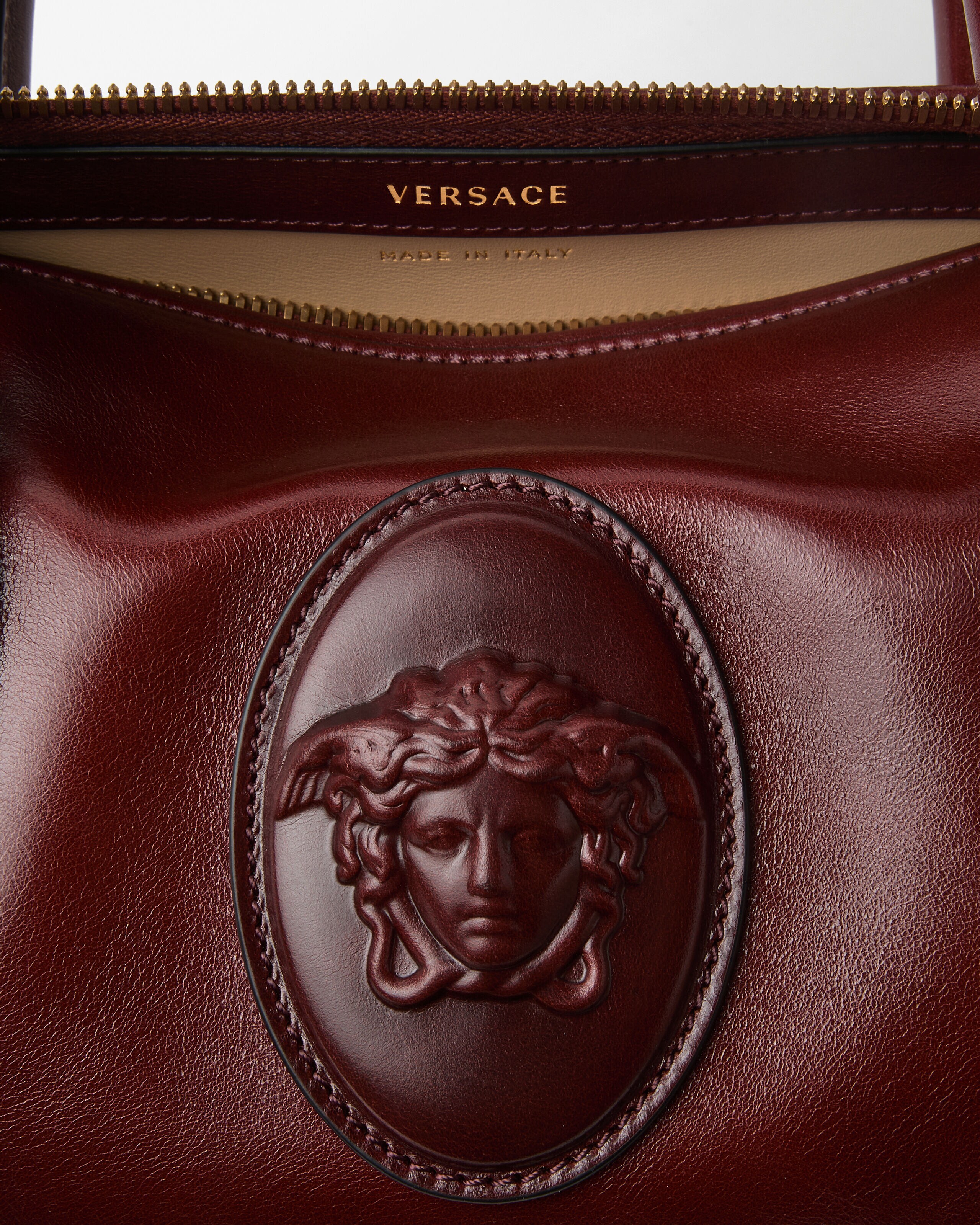 Roomy Small Leather Boston Bag Brown | VERSACE US