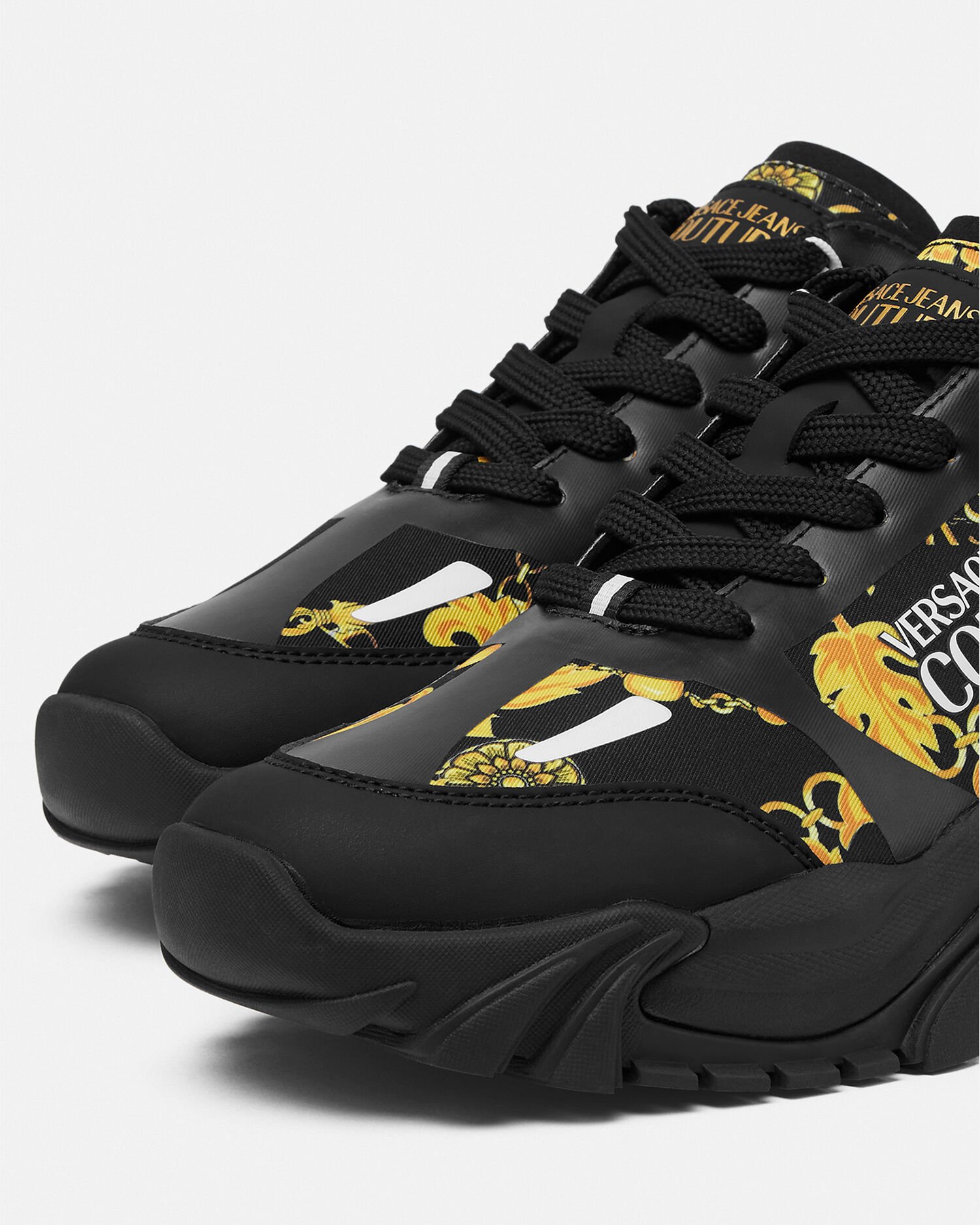Versace trainers black and gold sale