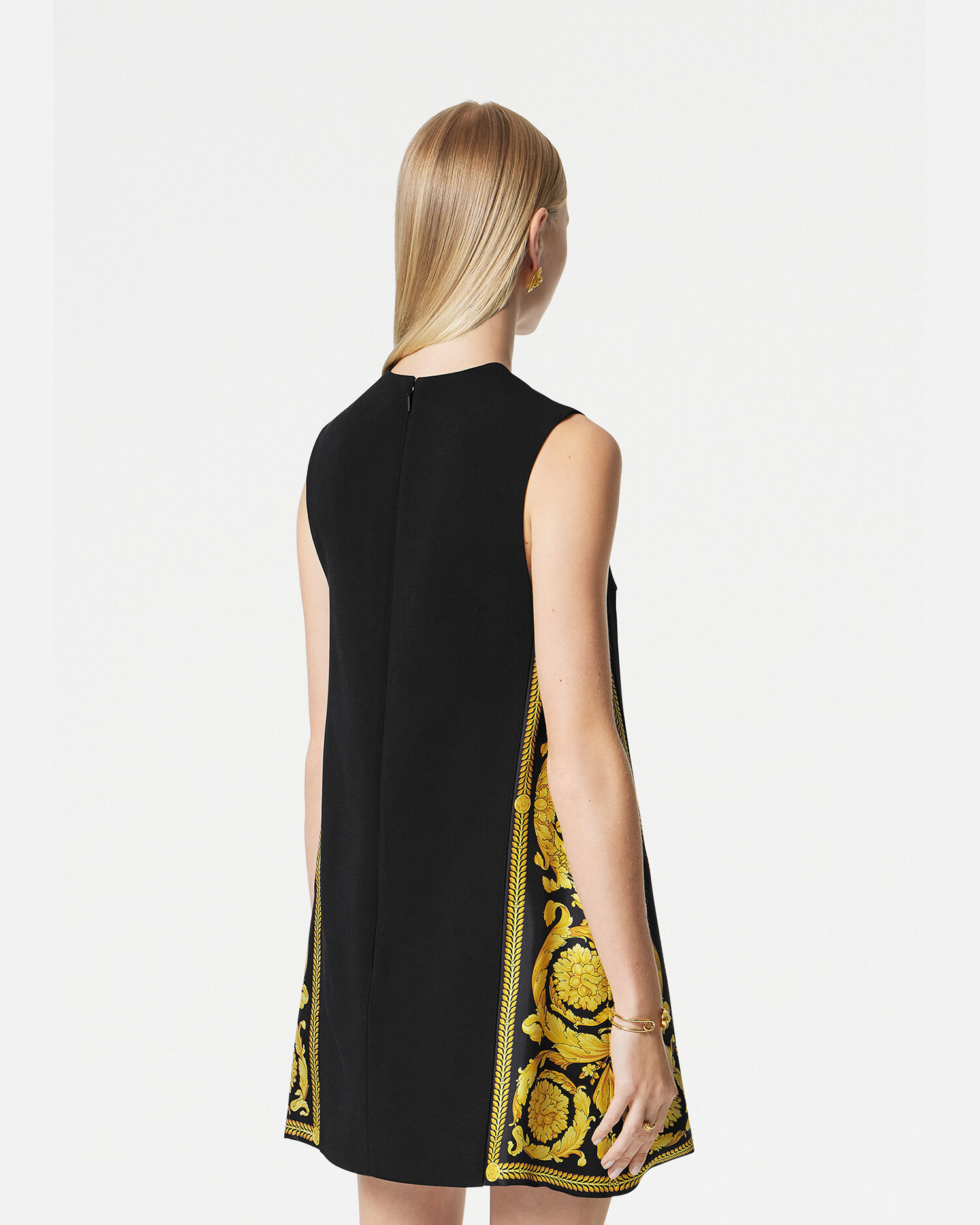 Versace gold shop and black dress