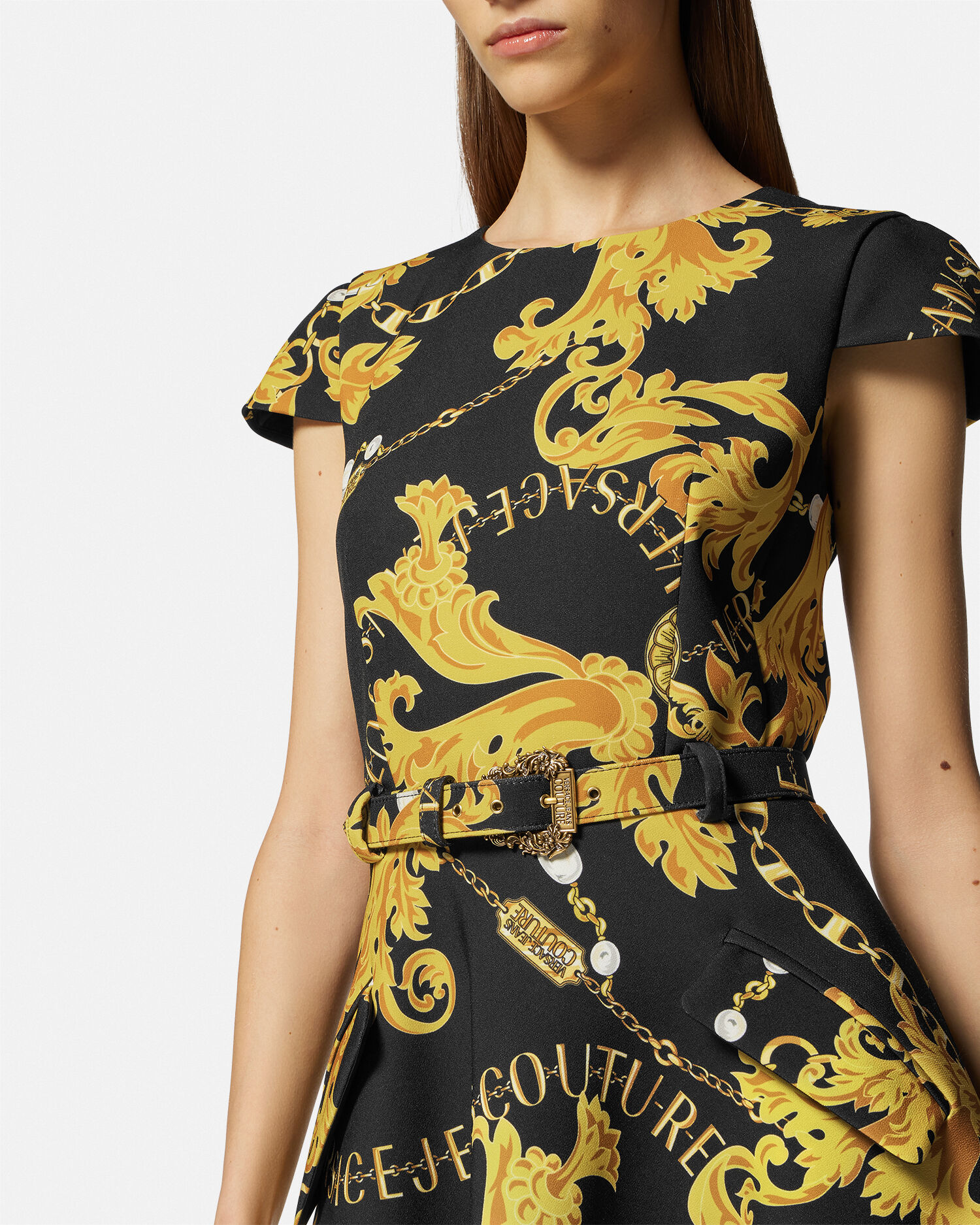 Versace gold shop and black dress