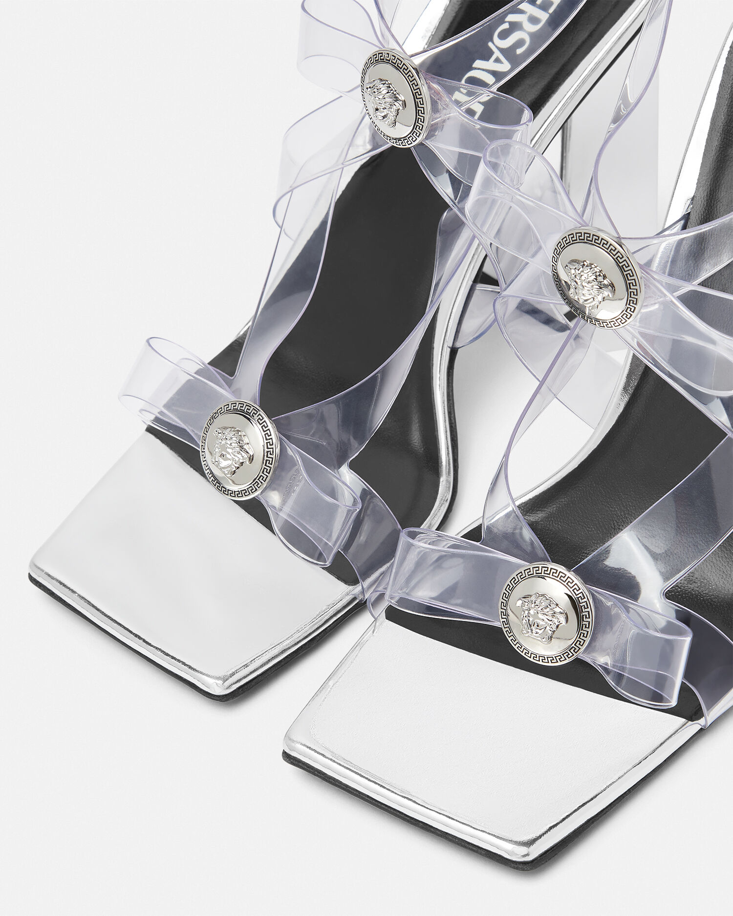 Silver cage shoes top
