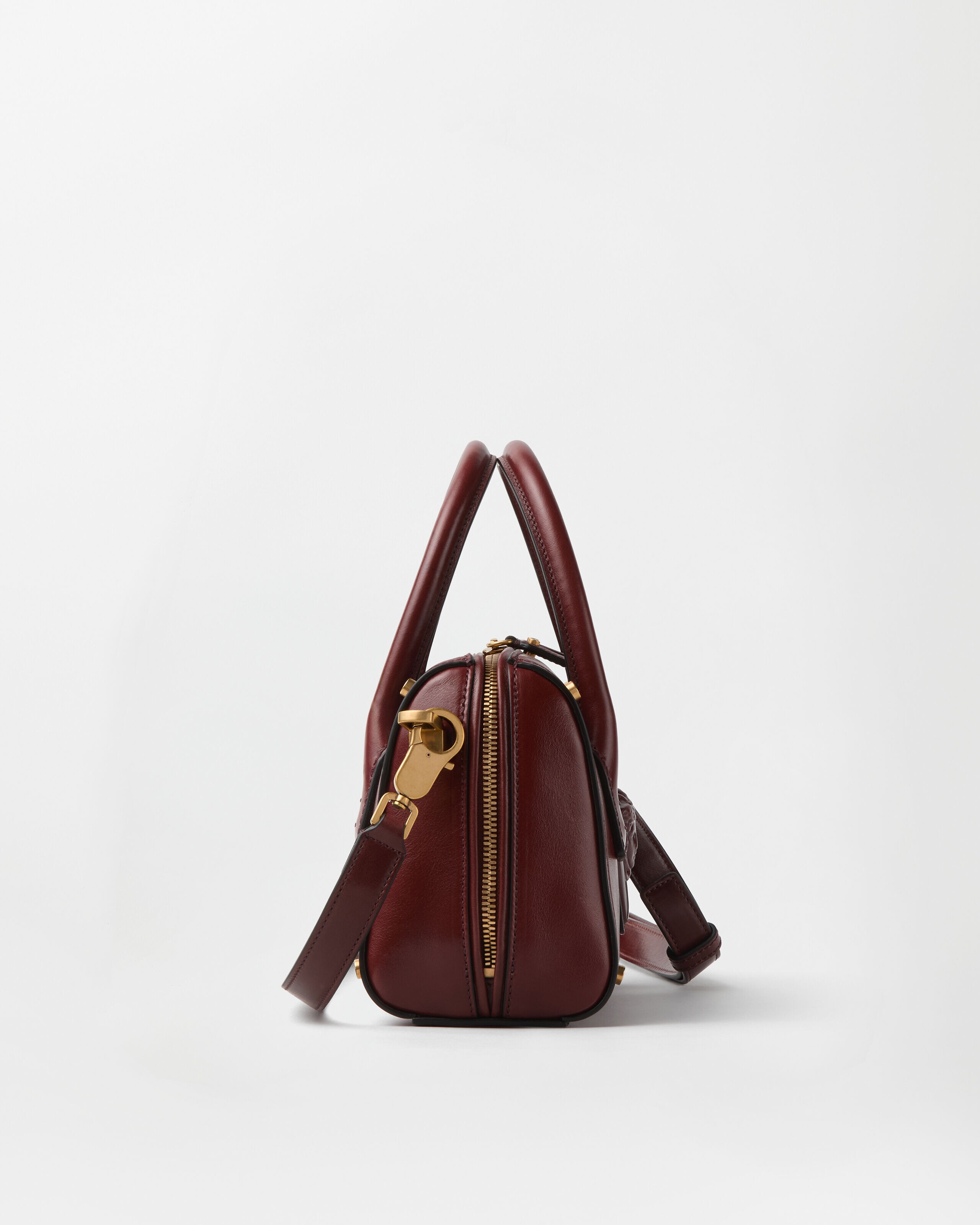 Roomy Small Leather Boston Bag Brown | VERSACE US