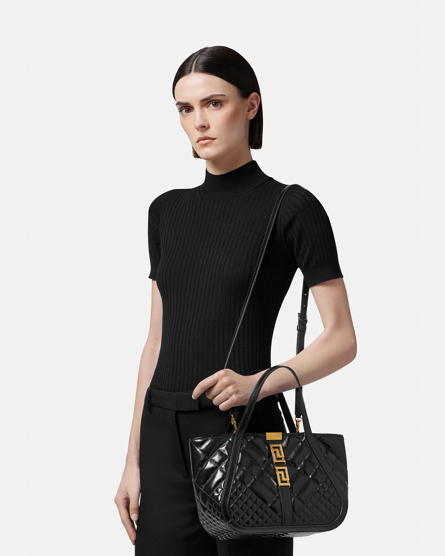 Versace black and gold online bag
