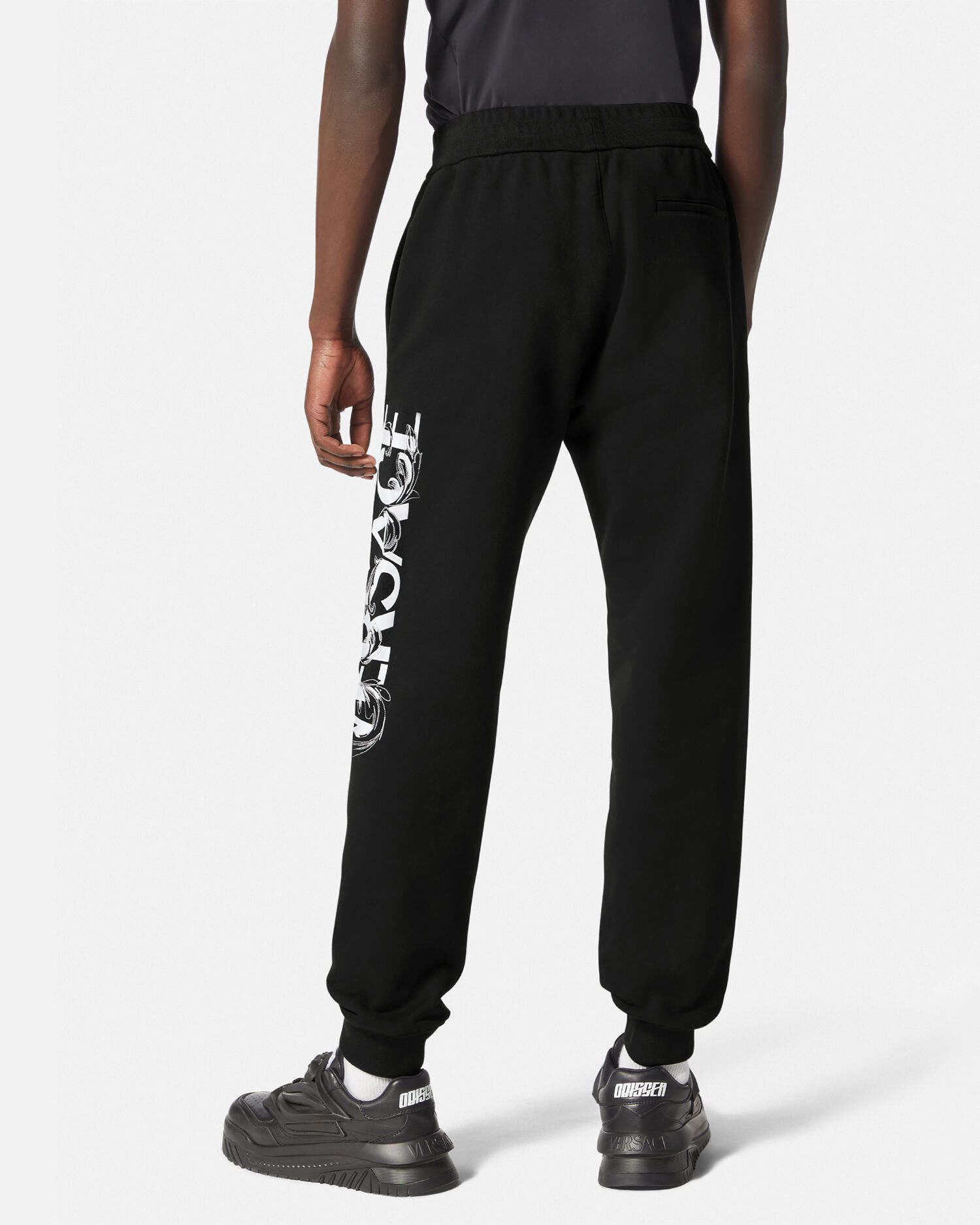 Pantaloni hotsell tuta versace