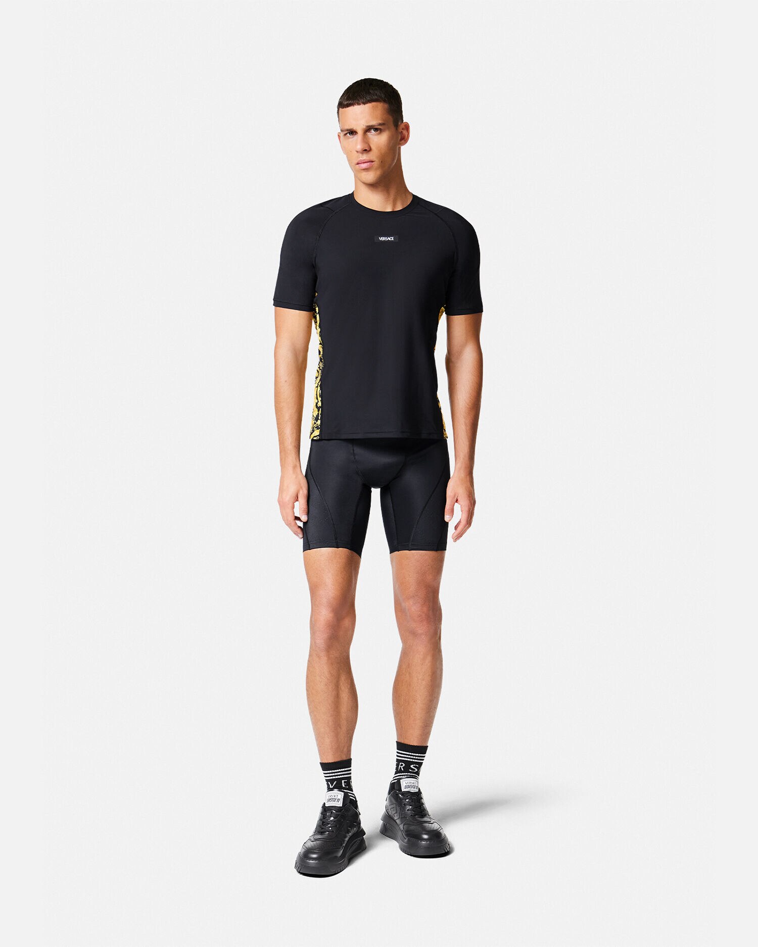 Versace logo-embellished T-shirt | Black | FARFETCH - トップス