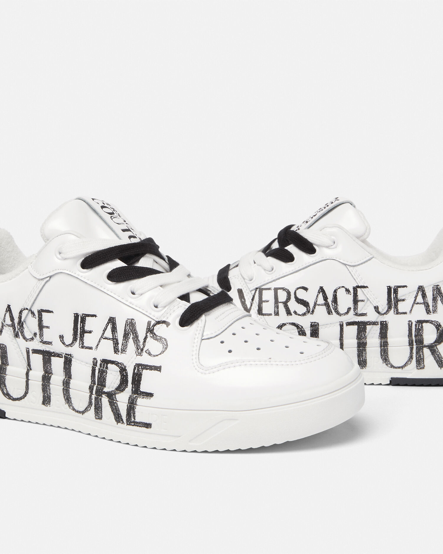 Versace shoes logo hotsell