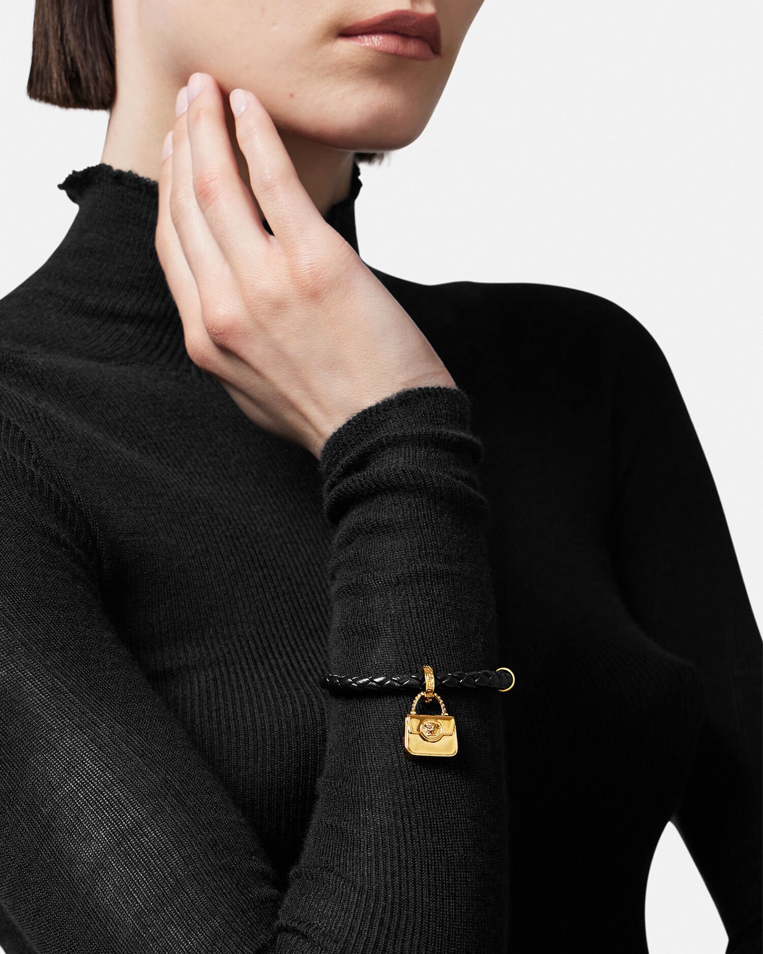 Braided leather on sale charm bracelet versace
