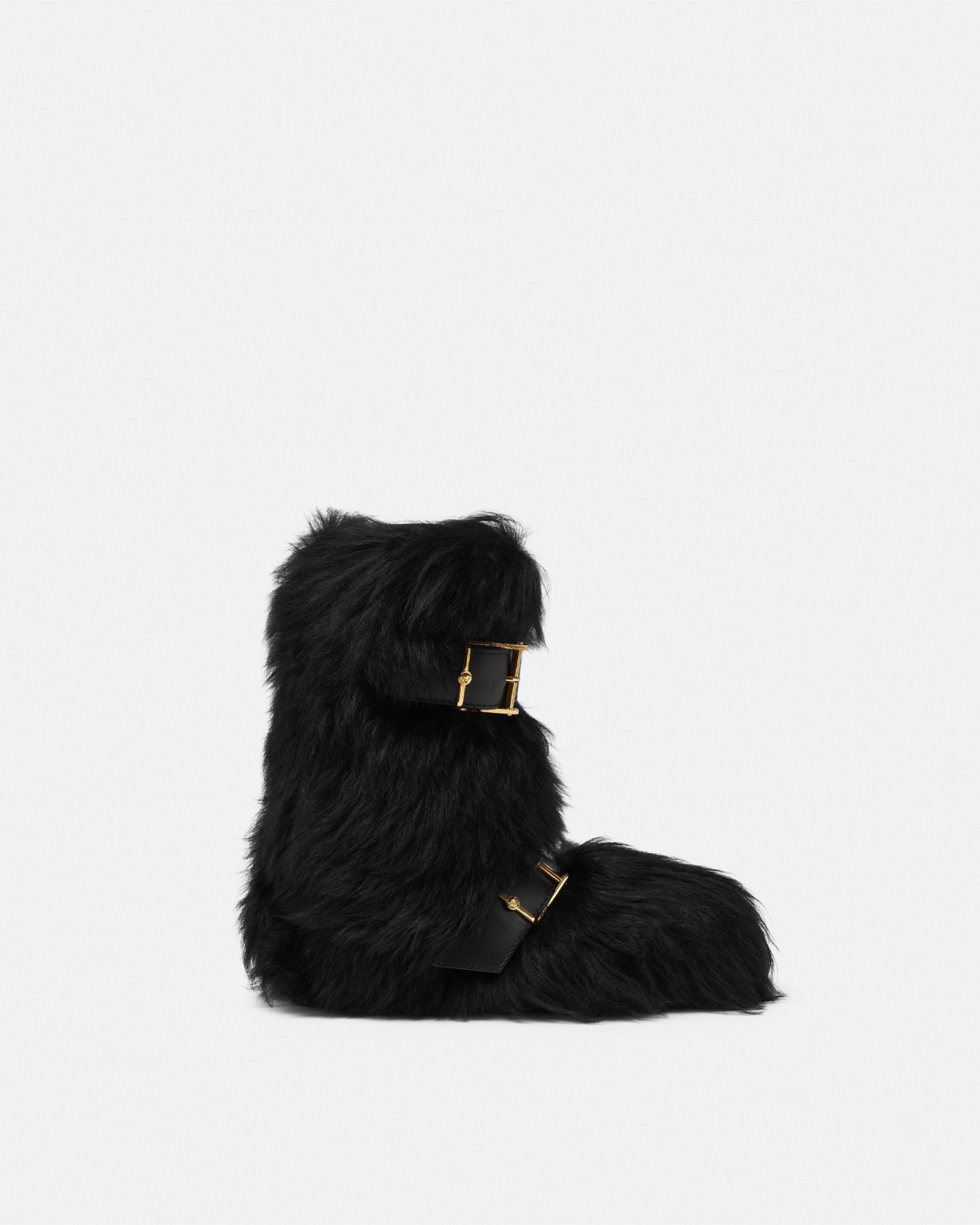 Versace Bastion Shearling Boots In Black+gold